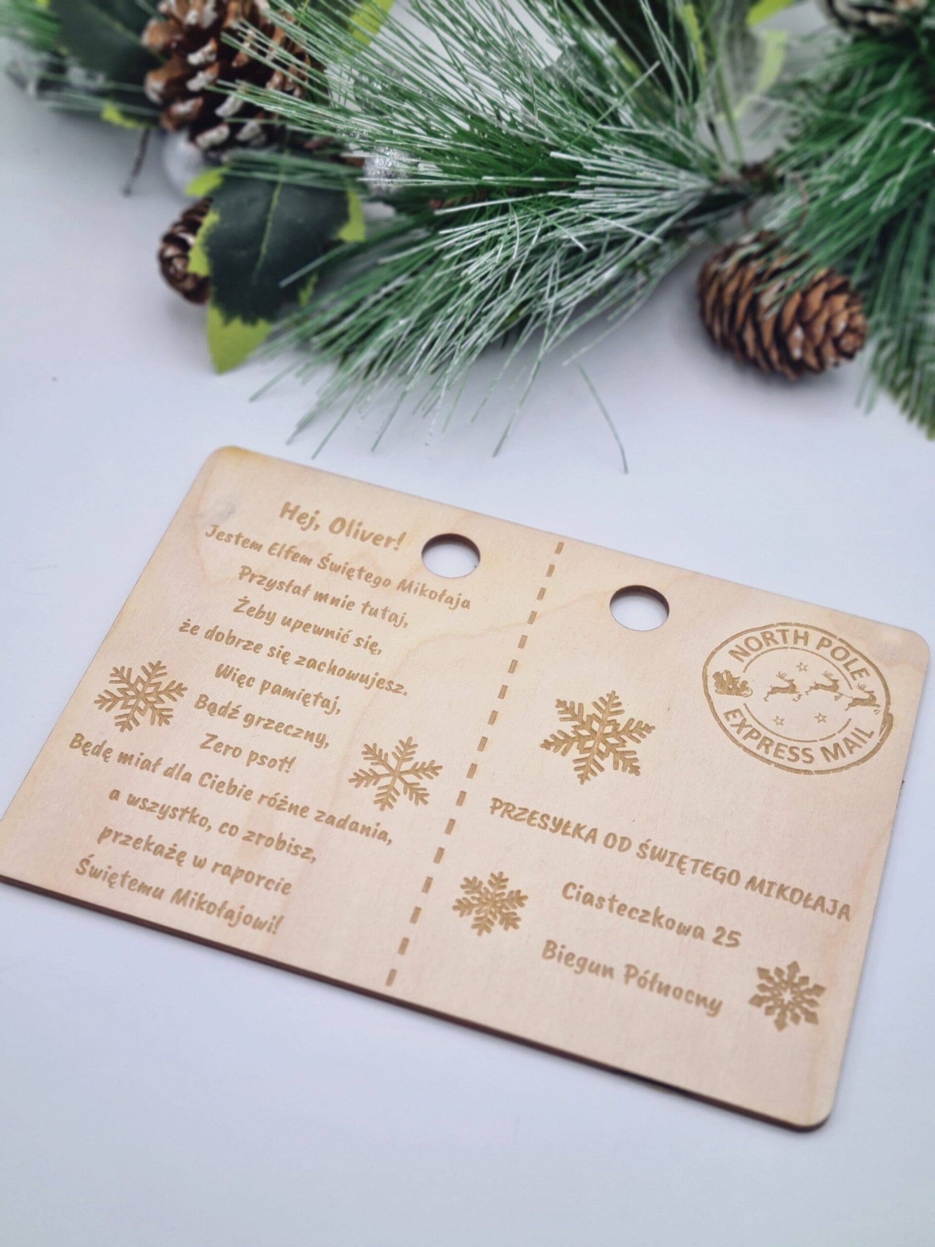 Elf z listem od Mikołaja